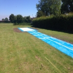 Wet Pour Rubber Surfacing in Oving 11